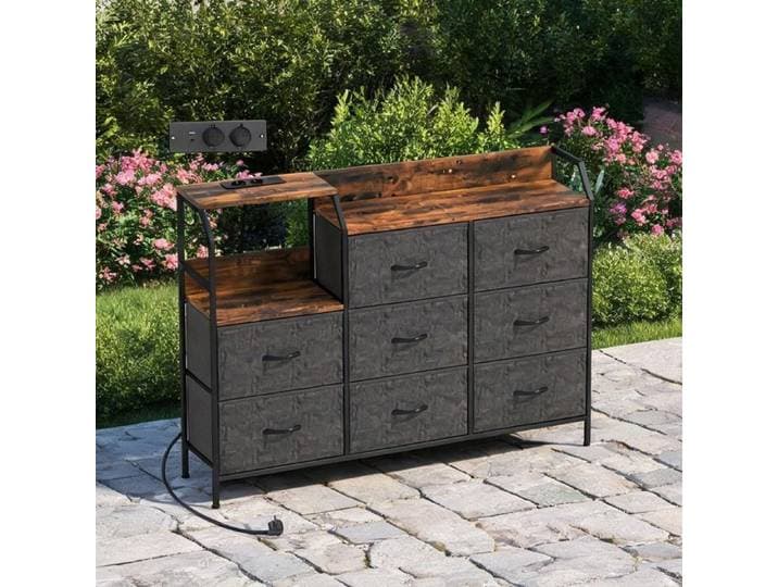 Meuble de rangement salon avec 8 tiroirs tissu cadre acier station de charge finition brown-toned 130 5 x 30 x 88 cm